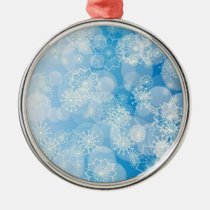 Ornement En Métal Flocons de Noël sur un fond bleu