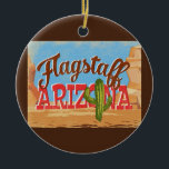 Ornement Flagstaff Arizona Désert Vintage<br><div class="desc">Flagstaff Arizona neo design de voyage vintage dans un drôle de style rétro cartoon avec le désert,  un cactus et des rochers. Bleu,  marron et rouge avec cactus vert.</div>