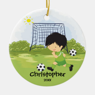 Ornement mignon de Noël de sport de footballeur