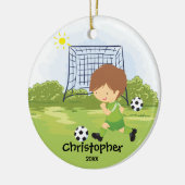 Ornement mignon de Noël de sport de footballeur (Gauche)