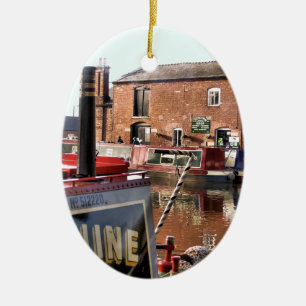 ORNEMENT OVALE EN CÉRAMIQUE CANAUX