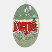 ORNEMENT OVALE EN CÉRAMIQUE DOCTEUR DE NOËL D'OBSTÉTRICIEN/GYNÉCOLOGUE (Gauche)