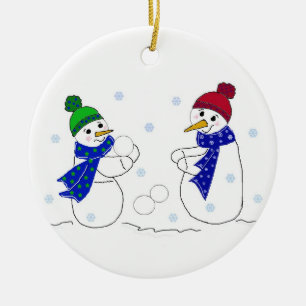 Ornement Rond En Céramique Bonhommes de neige jouant dans la neige