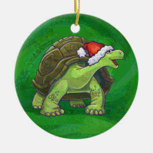 Ornement Rond En Céramique Tortue dans le casquette de Père Noël sur le ver