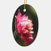 Ornement rouge de fleur au soleil (Gauche)