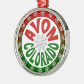 Ornement vert rouge de flocon de neige d'Avon le (Gauche)