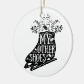 Ornement vintage de patin de glace (Gauche)