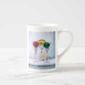 Ornements de Noël dans la tasse de porcelaine (Droite)