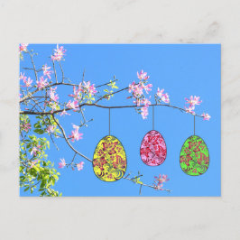 Ostereier auf einem blühenden Zweig Feestdagenkaart
