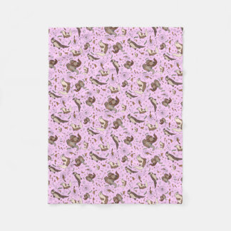 Otters in roze fleece deken
