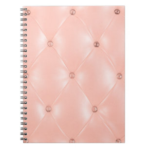 Oud roos, roze, achtergrond en textuur met leder notitieboek