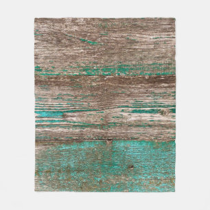 Oude bruinblauwe houten achtergrond met pellingpij fleece deken