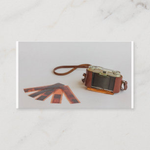 oude camera met negatieve on-business-kaart visitekaartje