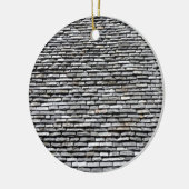 Oude daktop met schoorsteen keramisch ornament (Links)