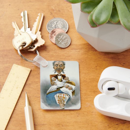 Oude familiewaardigheid, vader met vierlingbaby's sleutelhanger (Bureau)