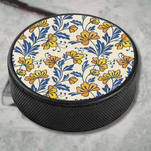 Oude gele oranje volksbloem in blauw blad hockey puck