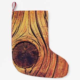 Oude houten textuur als achtergrond. kleur kleine kerstsok
