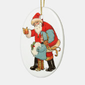 Oude kerst, kerstman met meisje keramisch ornament (Links)