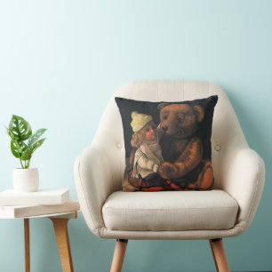 Oude kerstspullen, pop en teddybeer kussen