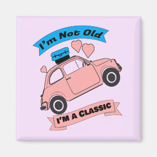 Oude klassieke roze auto magneet