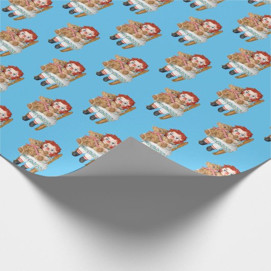 Oude lap pop met teddybeer cadeaupapier (Hoek)