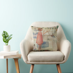 Oude meisje, kind doet wasgoed ophangen kleren kussen