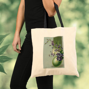Oude paarse bloemen bloeien in een paasei tote bag