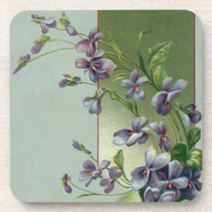 Oude paarse bloemen bloeiend in een paasei onderzetter