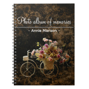 Oude patroonmap met afbeelding van fiets met bloem notitieboek