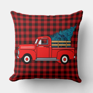 Oude rode pick-uptruck, buffelplaid, vakantie kussen
