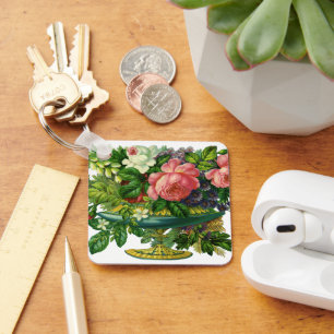 Oude roze rozen in vaas met bloemen sleutelhanger