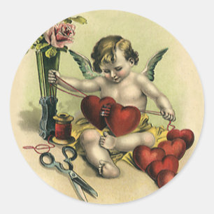 Oude victoriaanse engel naaister valentijnsdag ronde sticker