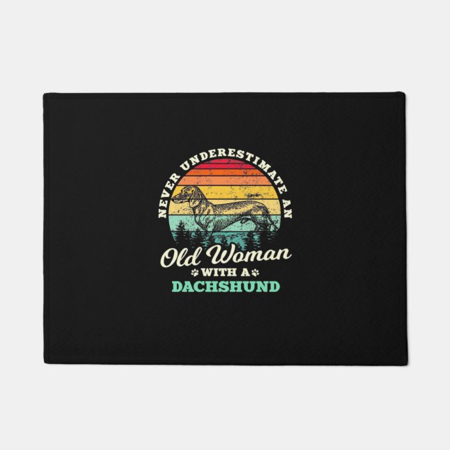 Oude vrouw met een dachshund deurmat (Voorkant)