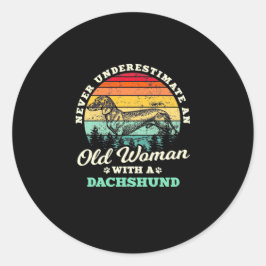 Oude vrouw met een dachshund ronde sticker