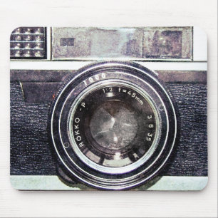 Oude zwarte camera muismat
