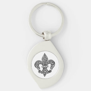 Oude zwarte en witte kantachtige Fleur De Lis Sleutelhanger