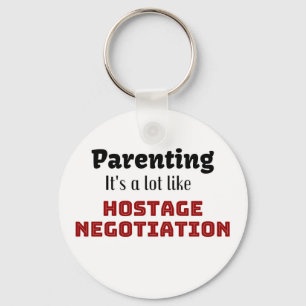 Ouderschap...Het is een soort gijzelonderhandeling Sleutelhanger