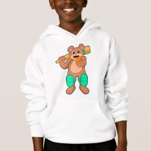 Ours au cricket avec chauve-souris de cricket