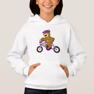 Ours avec vélo et casque