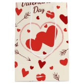 Ours en peluche tenant un sac cadeau moyen pour le (Dos)