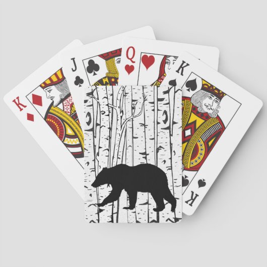 Ours noir dans des cartes de jeu d'arbres de (dos)