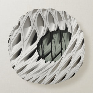 Ovaal zwart glas op wit oppervlak rond kussen