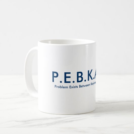 P.E.B.K.A.C. Tasse (Devant gauche)