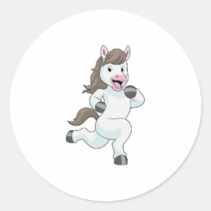 Paard tijdens draaiend bedrijf ronde sticker