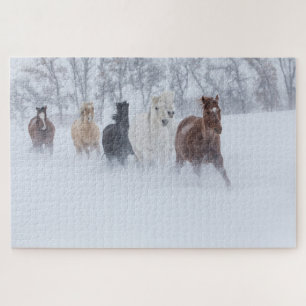 Paarden die door de sneeuw rennen legpuzzel