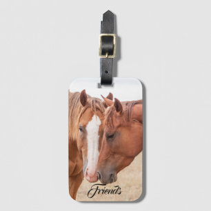 Paarden die in een weiland snuiven bagagelabel
