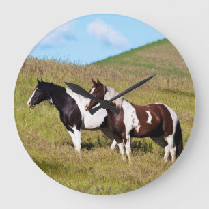Paarden op de heuvelhelling grote klok