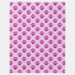 Paars pootafdrukpatroon op roze fleece deken