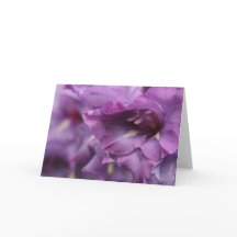 Paarse bloemengroetkaart