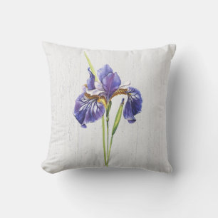 Paarse iris op gewitwasd hout kussen